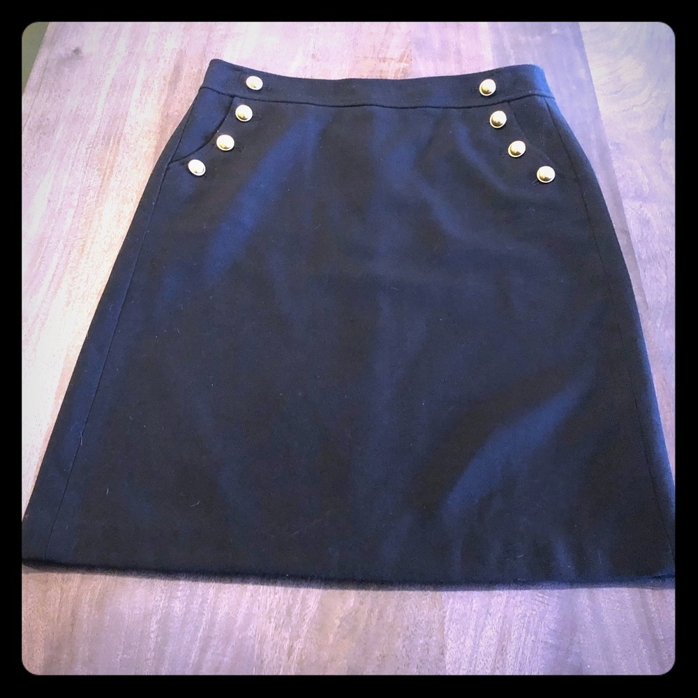 Loft black skirt with brass buttons and pockets.